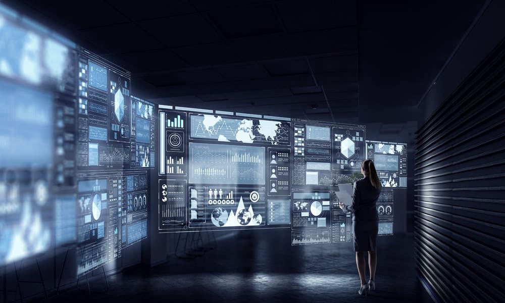 A woman standing in front of digital technology platform